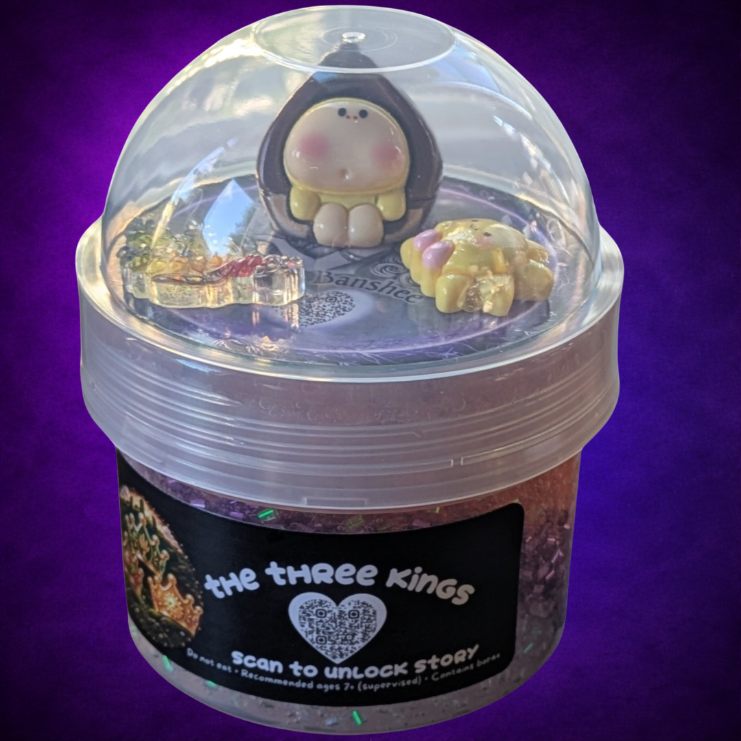 The Three Kings bingsu slime in its labelled jar with a clear dome lid and three story charms.